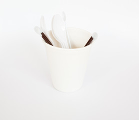 Fototapeta na wymiar Many tea spoons in paper cup