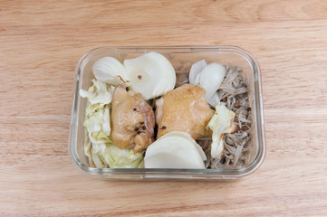 Grilled chicken breast on wooden table, top view