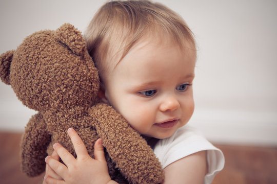 baby with a teddy