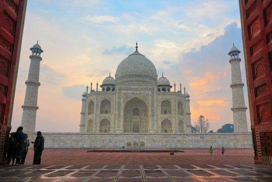 Taj Mahal complex on sunrise, Agra, Uttar Pradesh, India. Photo from the gate of mosque.