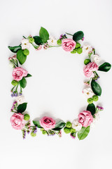 round frame wreath pattern with roses, pink flower buds, branches and leaves isolated on white background. flat lay, top view