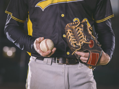 Baseball player holding baseball