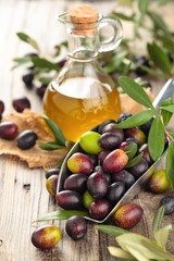 Fresh olives and olive oil.