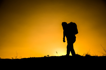 silhouette of man in the mountainous area athletes