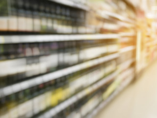 Wine bottles on shelf in wine store