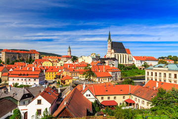 Fototapeta na wymiar Beautiful panoramic landmark view to church and castle in Cesky Krumlov, Czech republic. UNESCO World Heritage Site