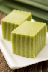 Pandan Coconut Cream Agar Agar w Pandanus Leaves in Background; non-sharpened file