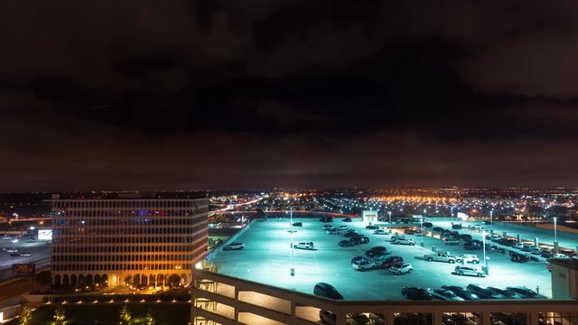 Time-lapse of plane and car traffic at LAX at night in Los Angeles, CA
