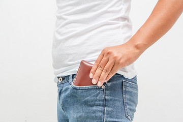 male and wallet in the back pocket of his blue jean