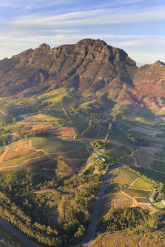 South Africa, Western Cape, Stellenbosch, Aerial view of Simonsberg Mountain range and Stellenbosch Winelands