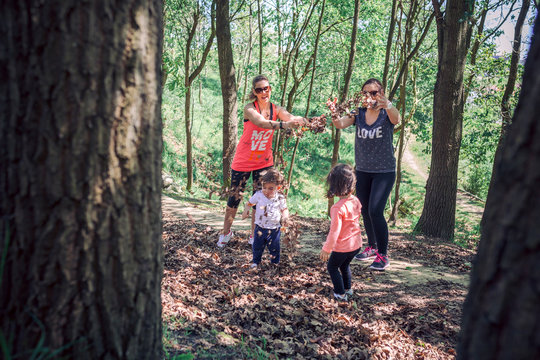 Mothers with kids having fun in park