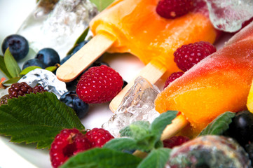 Fototapeta na wymiar Composition of delicious ice cream, fruits and ice cubes