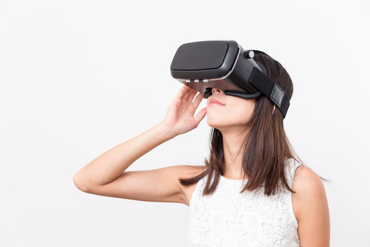 Woman looking though VR device