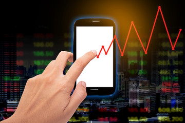 Hand holding smartphone with pointing business chart screen and representing business growth with colorful business chart  background.