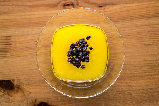 Turkish Traditional Dessert Zerde Pudding with Raisin.