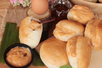 bread with custard delicious on wood background.