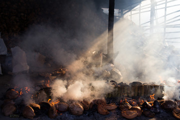 Tradition of the method for burning bamboo rice or local Thai ca