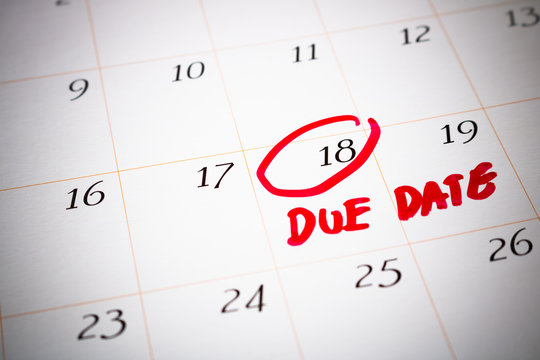Due Date day, the 18th, Red circled mark on a white calendar, as
