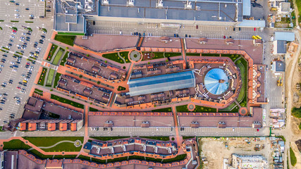 New outlet Center of Kiev suburbs in the Dutch style. Ukraine. Aerial view. From above. Top view