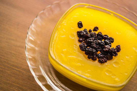 Turkish Traditional Dessert Zerde Pudding with Raisin.