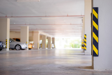 Car parking building hall with column. © luengo_ua