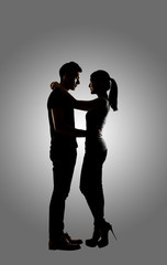 Silhouette of young Asian couple