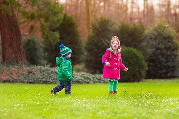 Kids playing in autumn park