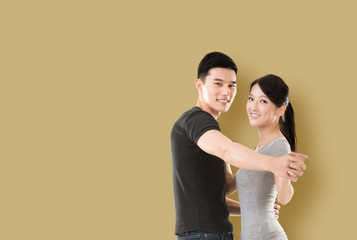 Asian couple dancing