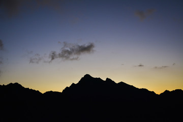 Mountains silhouettes scenery in the evening colors