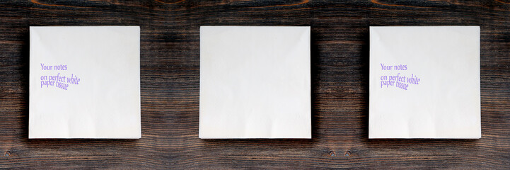 White paper tissues with copy space on rustic wooden background. Top view