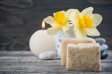 Organic soap and yellow flowers