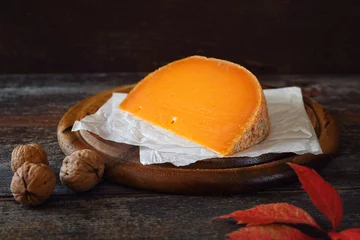 Fototapeten Mimolette cheese and walnuts © photosimysia