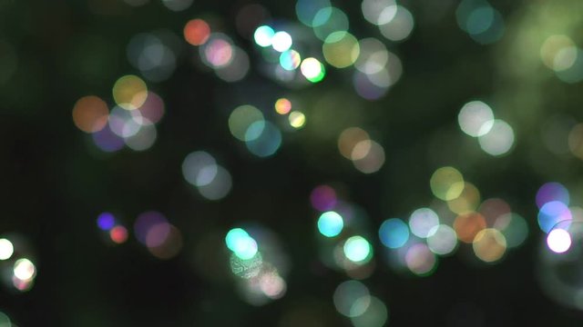 Many small bubbles scatter in different directions.