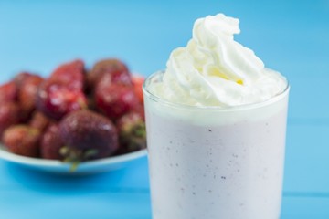 Strawberry milkshake with whipped cream