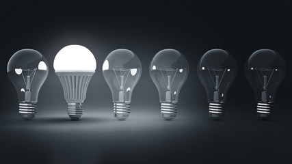 Glowing LED bulb and simple light bulbs. 3d rendering