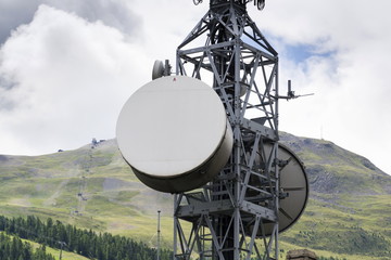 Cell phone transmitters on telecommunication tower in Livigno mountains