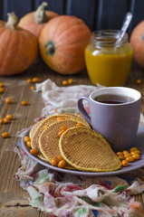 Pumpkin pancakes with sea buckthorn sauce for breakfast  
