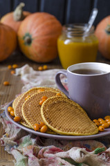 Pumpkin pancakes with sea buckthorn sauce for breakfast  