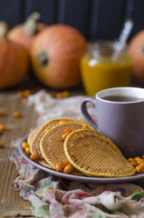 Pumpkin pancakes with sea buckthorn sauce for breakfast  