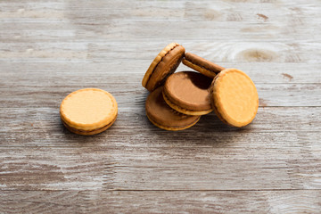 Pile of tasty cookies on the wooden table