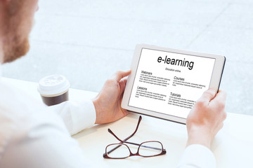 e-learning, business education online, hands with tablet