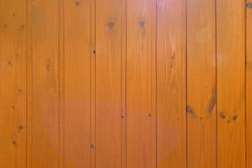 Vertical wall paneling wood texture. Wooden boards surface with regular structure. Natural retro background.