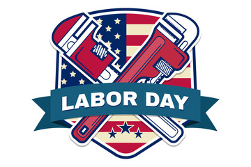 Labor day badge emblem with wrenches and American flag.