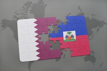 puzzle with the national flag of qatar and haiti on a world map background.