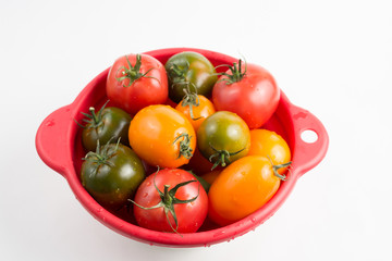 Ripe colorful red, yellow and green kumato tomatoes 