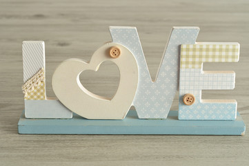Plakat Valentine's Day. Love in blue letters