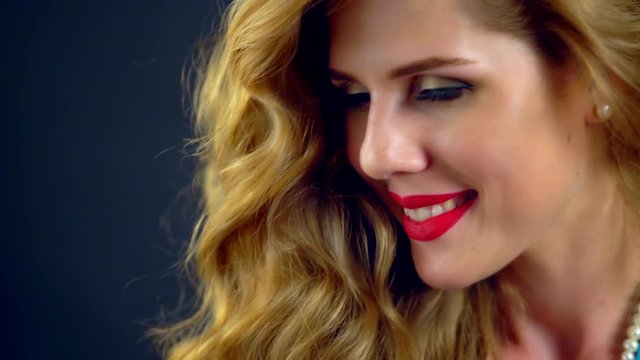 Portrait og beautiful girl with long hair. Girl laught and send blow kiss.4k