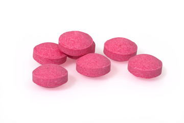 Obraz na płótnie Canvas Pink pills closeup drug macro photography