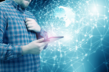 Man using digital tablet . Mixed media