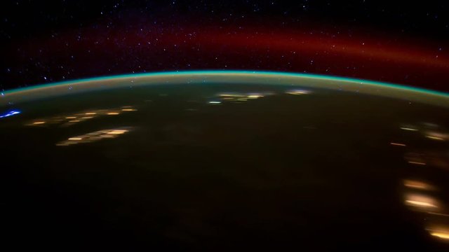  ISS From North America to South Atlantic Ocean, Time Lapse 4K. Created from Public Domain images, courtesy of NASA JSC : http://eol.jsc.nasa.gov. Flare and subtle motion effect